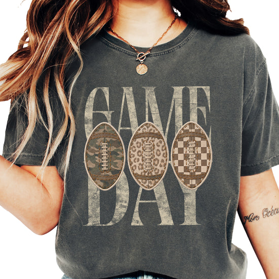 Game Day football shirt for women in Pepper, styled flat lay, Comfort Colors 1717 garment-dyed heavyweight cotton tee by Olive Loves Apple