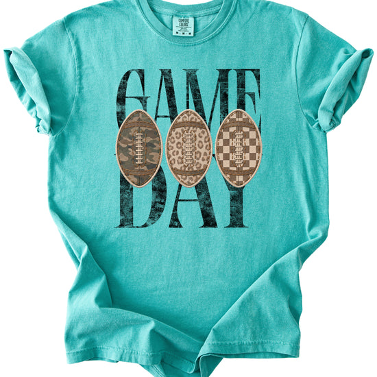 Game Day football shirt for women in Seafoam, detail view of the ink-printed football patch graphic, Comfort Colors 1717 garment-dyed heavyweight cotton tee by Olive Loves Apple