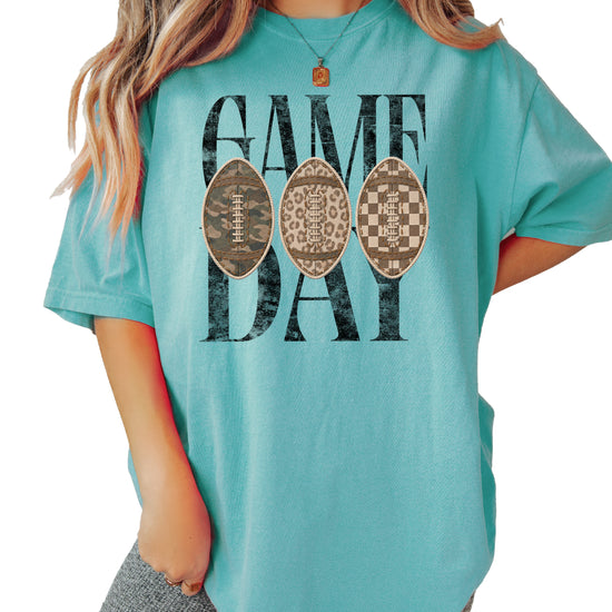 Game Day football shirt for women in Seafoam, styled flat lay, Comfort Colors 1717 garment-dyed heavyweight cotton tee by Olive Loves Apple