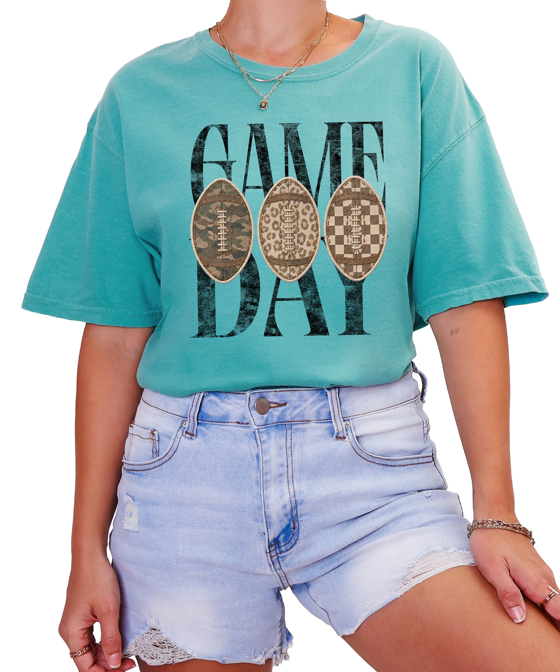 Game Day football shirt for women in Seafoam, lifestyle view worn by a model, Comfort Colors 1717 garment-dyed heavyweight cotton tee by Olive Loves Apple