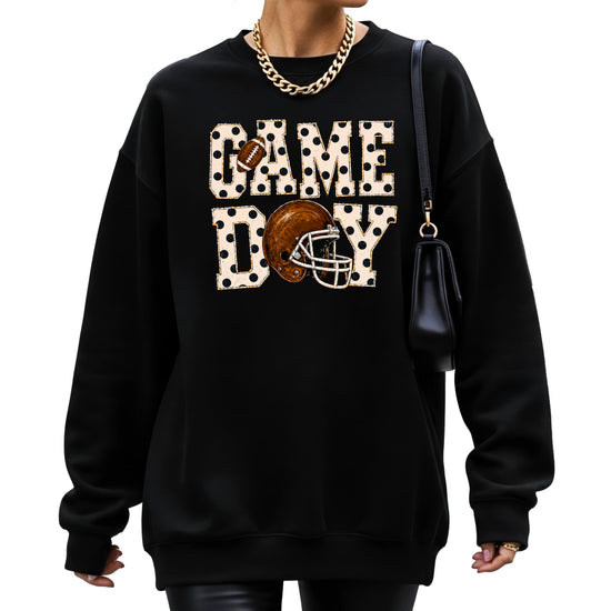 Black game day polka dot football crewneck sweatshirt, graphic close up