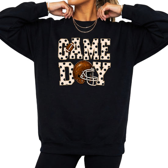 Black game day polka dot football crewneck sweatshirt, lifestyle view