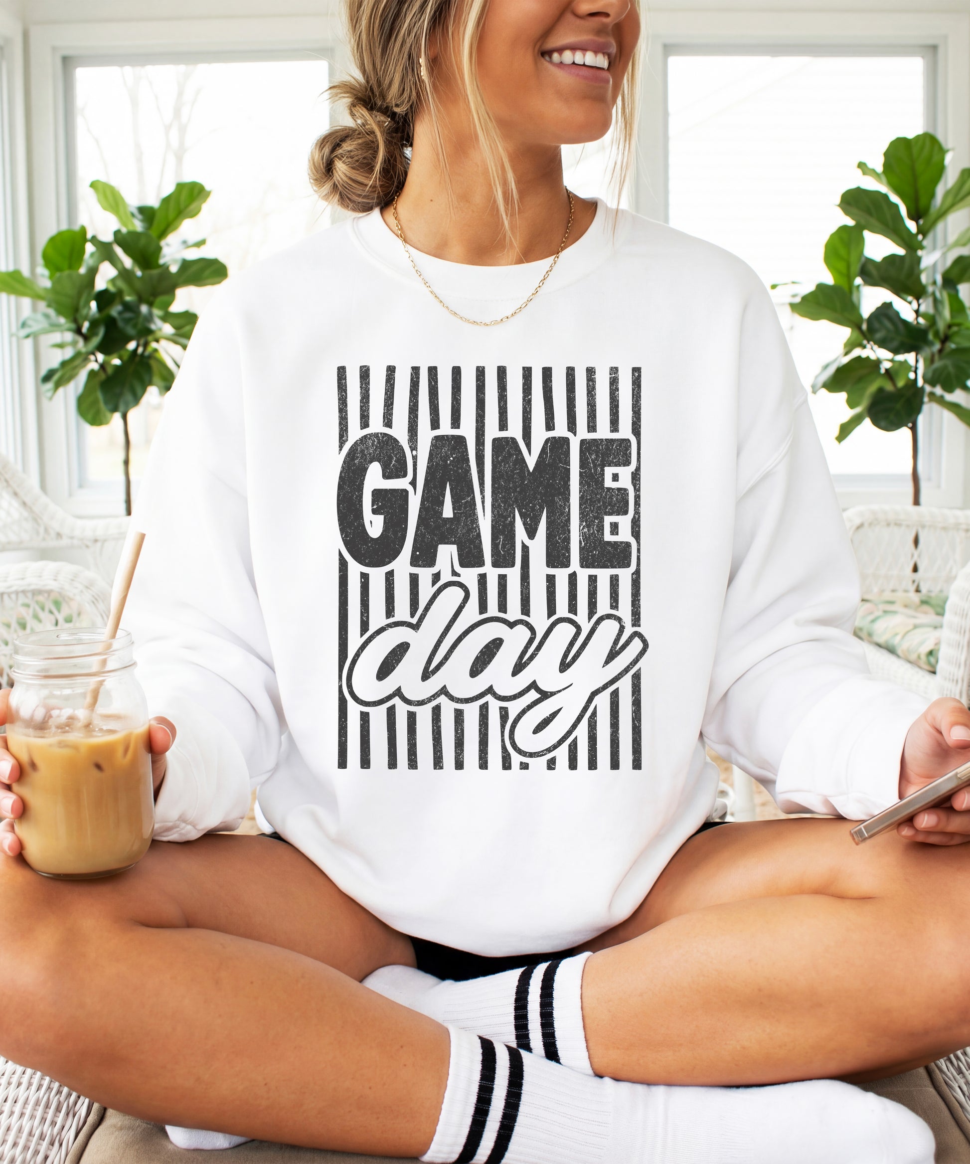 Game Day striped distressed football crewneck sweatshirt for women and teen girls, Black on White Sweatshirt, styled view