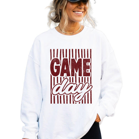 Game Day striped distressed football crewneck sweatshirt for women and teen girls, Maroon on White Sweatshirt, styled view
