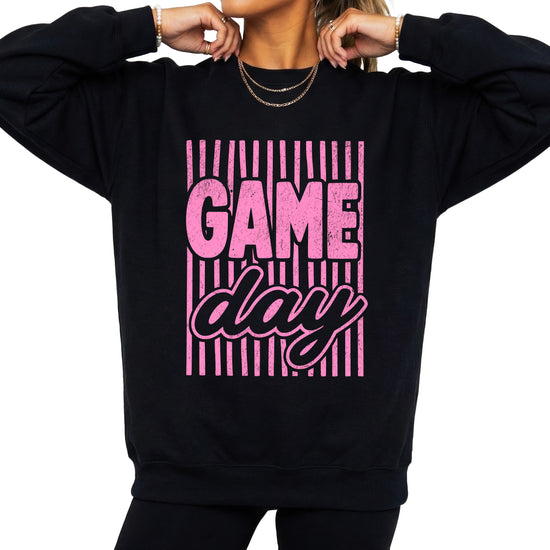 Game Day striped distressed football crewneck sweatshirt for women and teen girls, Pink on Black Sweatshirt, front view