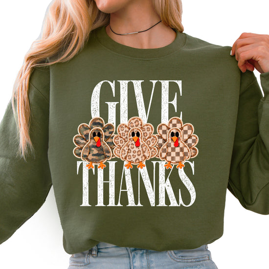 Give Thanks Thanksgiving sweatshirt for women in Army Green with camo, leopard and checkered turkeys