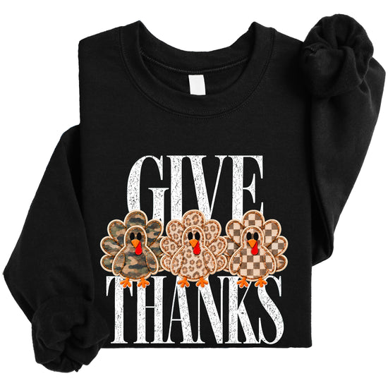 Give Thanks Thanksgiving sweatshirt for women in Black with camo, leopard and checkered turkeys