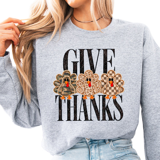Give Thanks Thanksgiving sweatshirt for women in Gray with camo, leopard and checkered turkeys