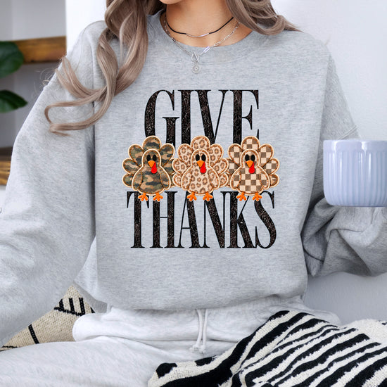 Give Thanks Thanksgiving sweatshirt for women in Gray with camo, leopard and checkered turkeys