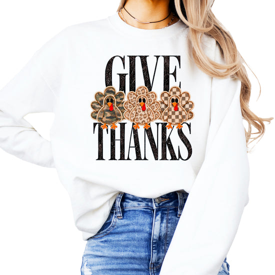 Give Thanks Thanksgiving sweatshirt for women in White with camo, leopard and checkered turkeys