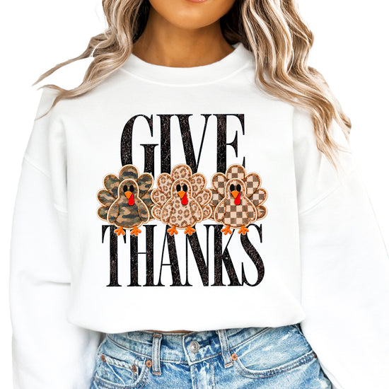 Give Thanks Thanksgiving sweatshirt for women in White with camo, leopard and checkered turkeys