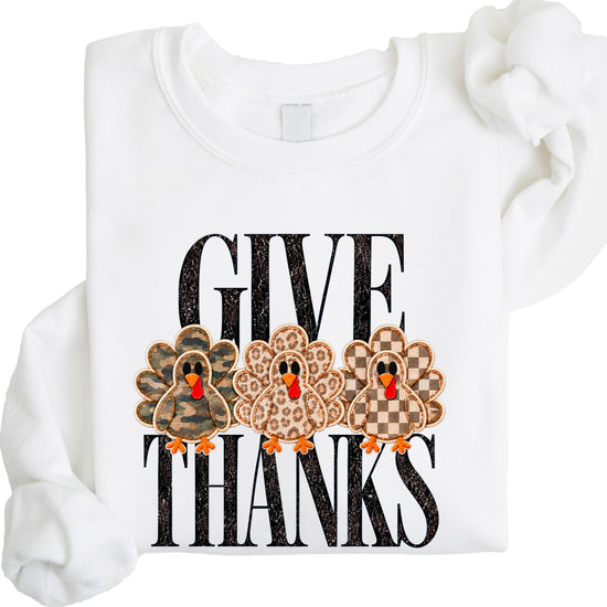 Give Thanks Thanksgiving sweatshirt for women in White with camo, leopard and checkered turkeys