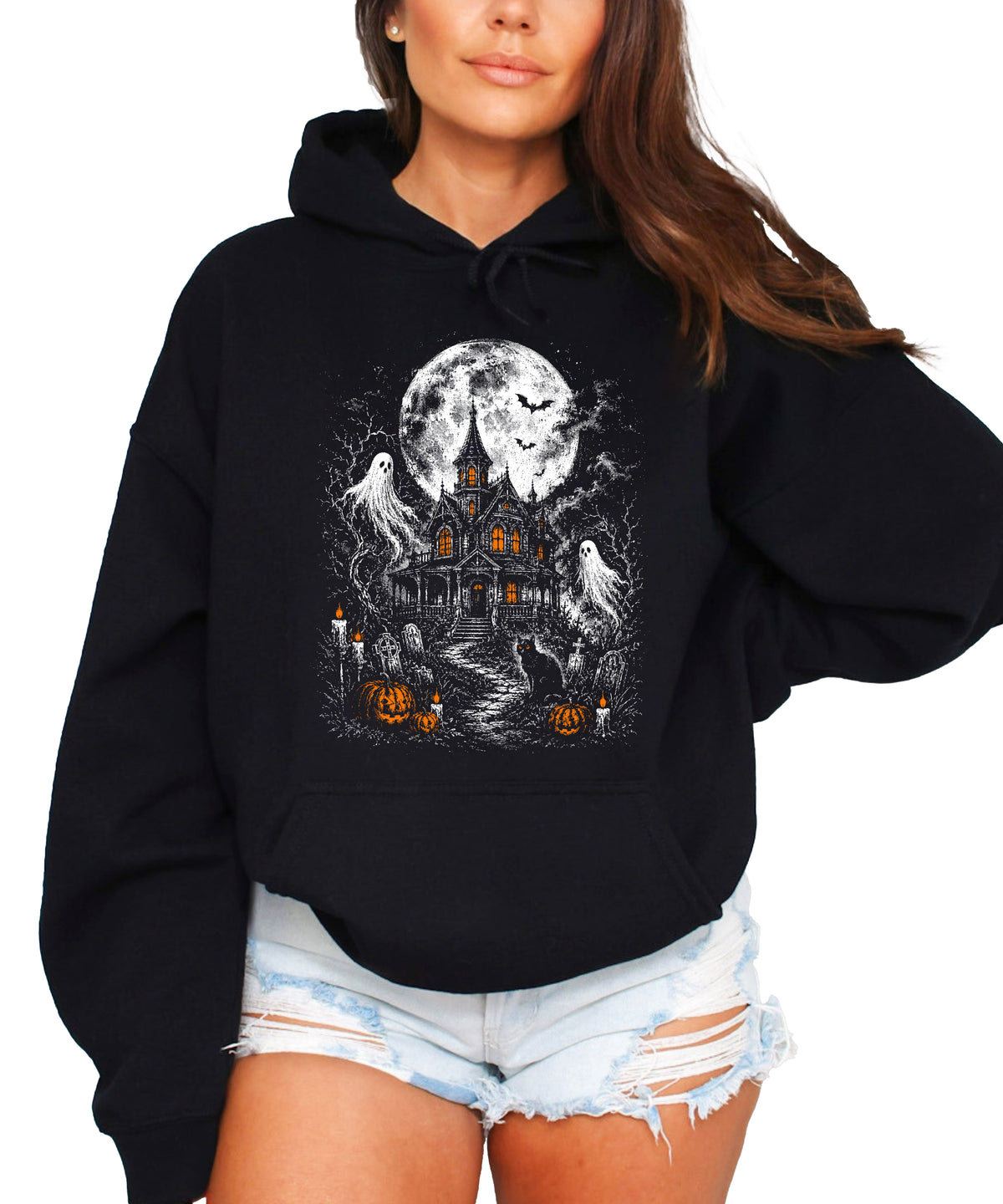 Black haunted house Halloween hoodie for women with moonlit house, ghosts, black cat and jack-o-lanterns graphic