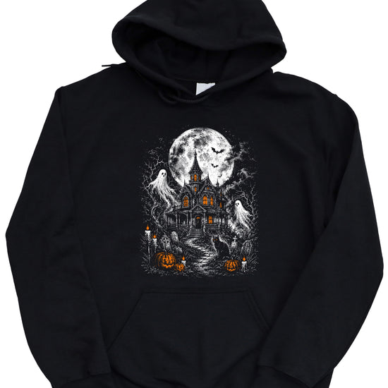 Black haunted house Halloween hoodie shown on model, spooky season graphic pullover