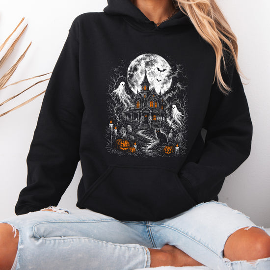 Black haunted house Halloween hoodie back and fit view, adult sizes small to XL