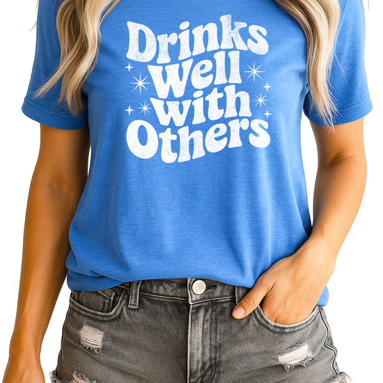 Drinks Well With Others funny graphic tee for women in Heather Blue, front view