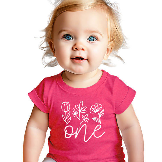 Floral One first birthday shirt for baby girls in vintage pink, front view