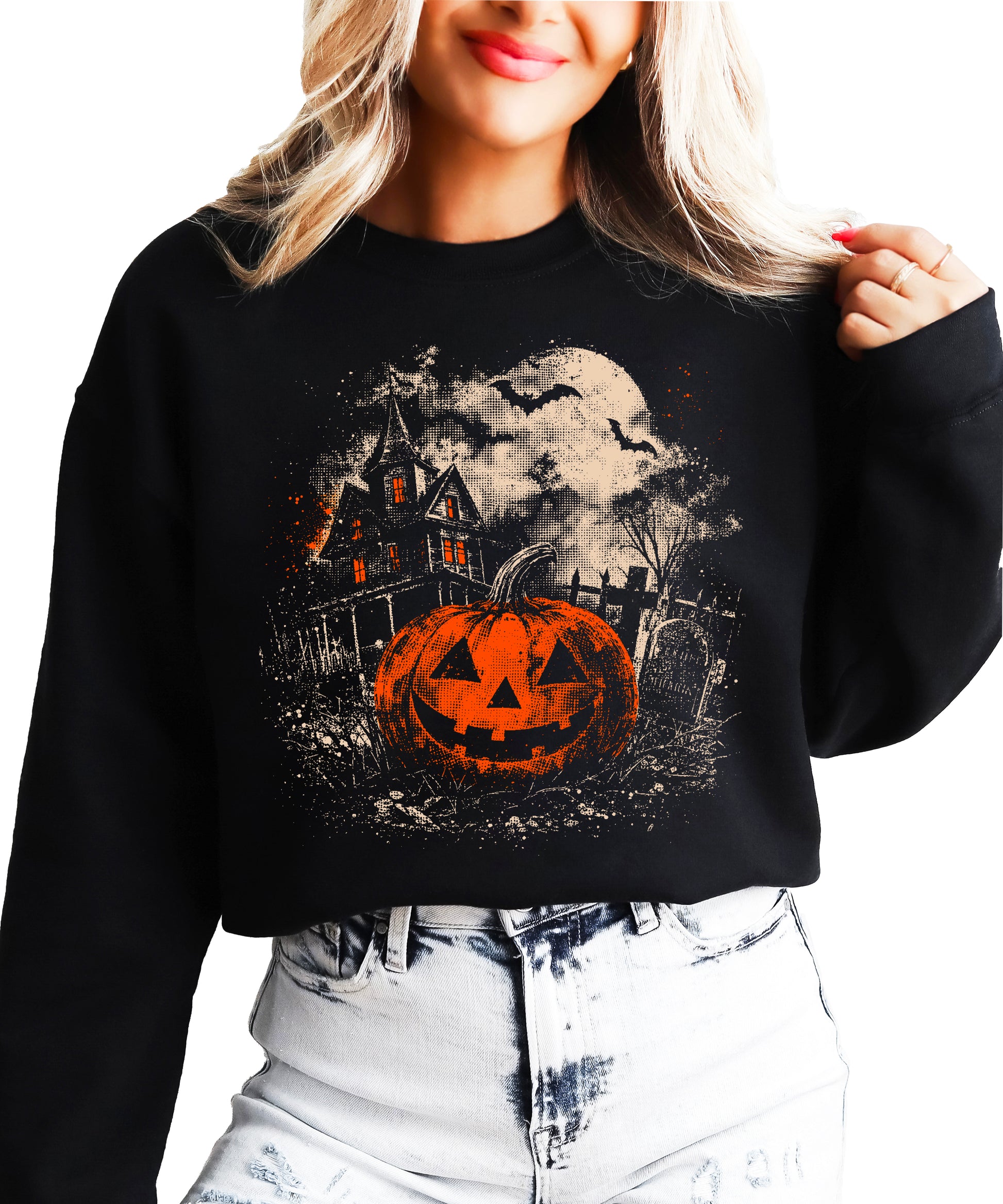 Black crewneck sweatshirt with distressed vintage jack o lantern, haunted house and bats Halloween graphic, front view