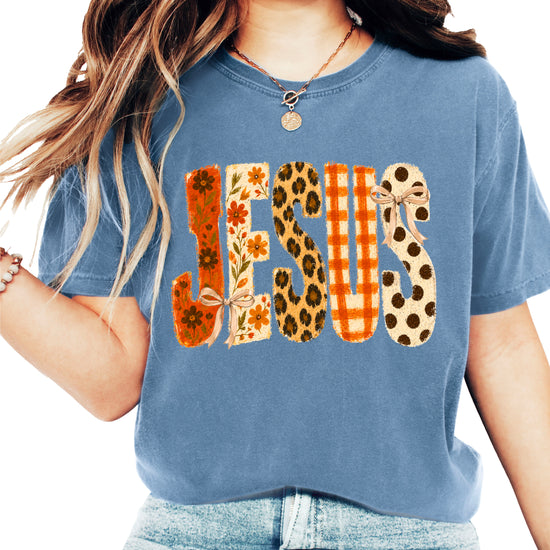 Jesus floral leopard bow Christian Easter graphic tee in Blue Jean, front view