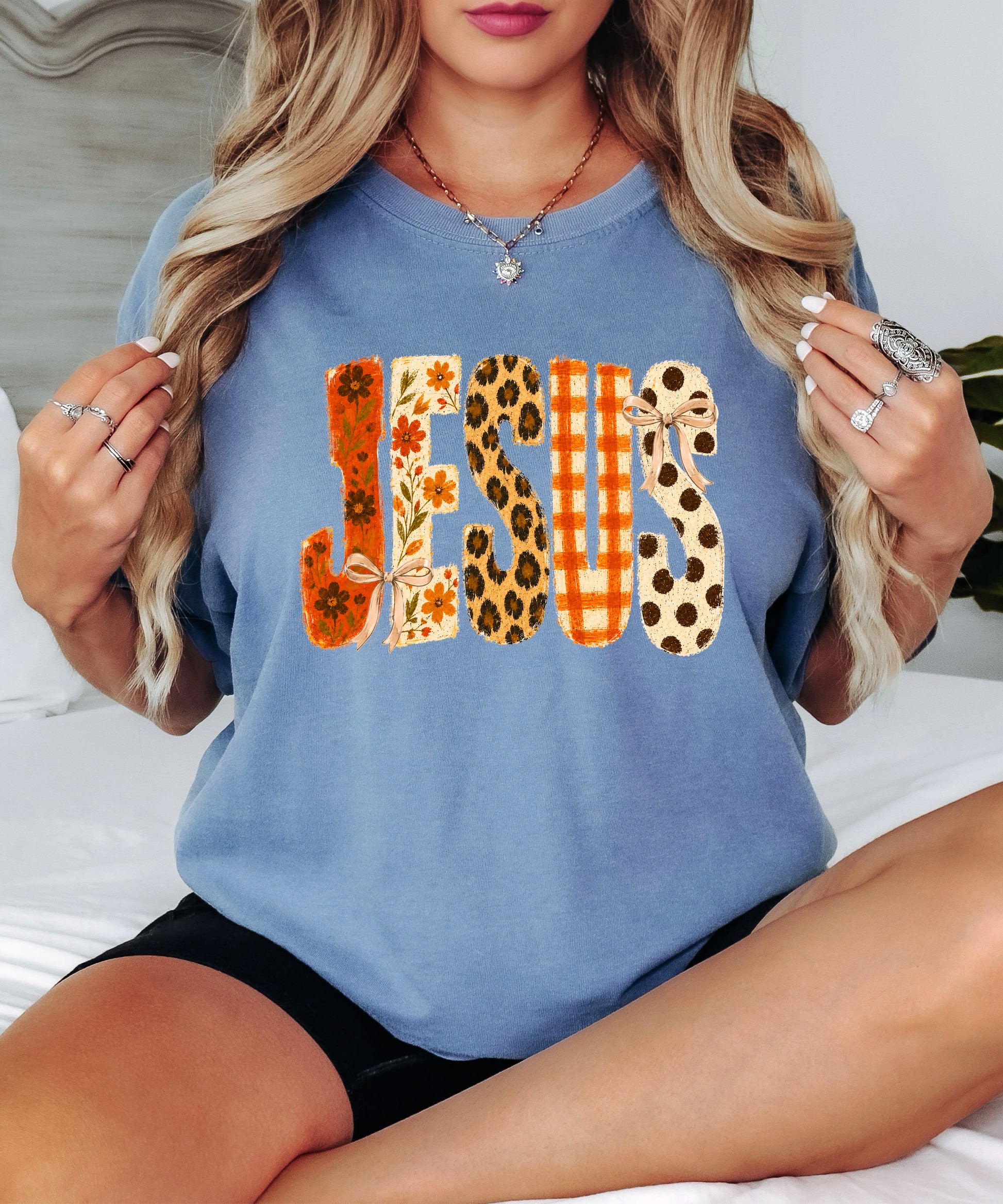 Jesus floral leopard bow Christian Easter graphic tee in Blue Jean, lifestyle view