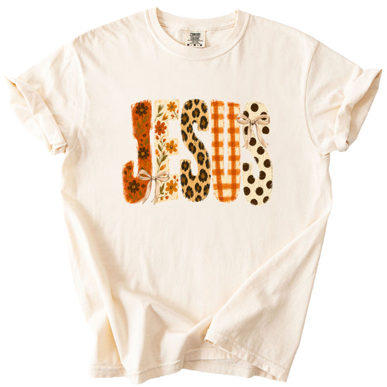 Jesus floral leopard bow Christian Easter graphic tee in Ivory, styled view