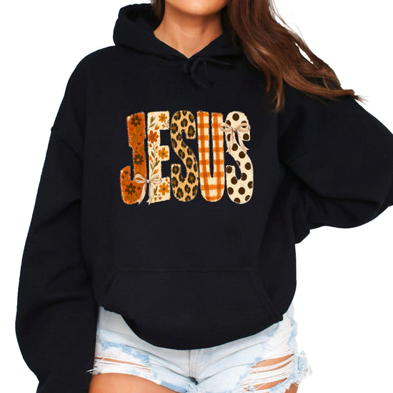 Jesus floral leopard coquette bow Christian hoodie in Black, front view
