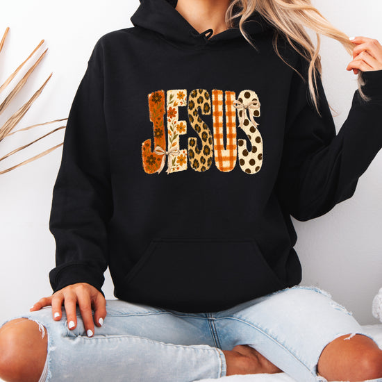 Jesus floral leopard coquette bow Christian hoodie in Black, model view