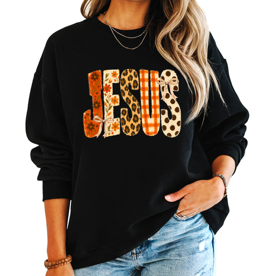 Jesus fall floral leopard Christian faith crewneck sweatshirt in Black, front view