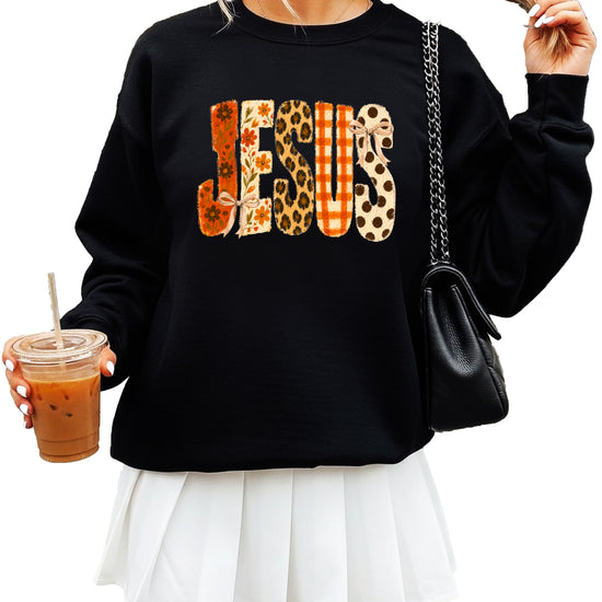 Black Jesus fall floral sweatshirt, close up of lettering detail