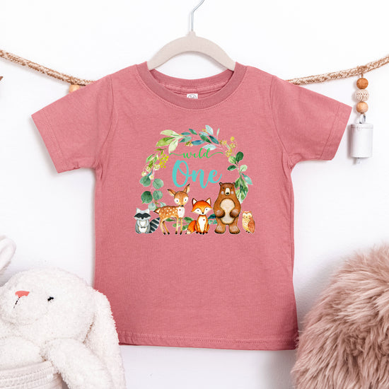 Mauve Wild One wreath first birthday tee flat lay front view