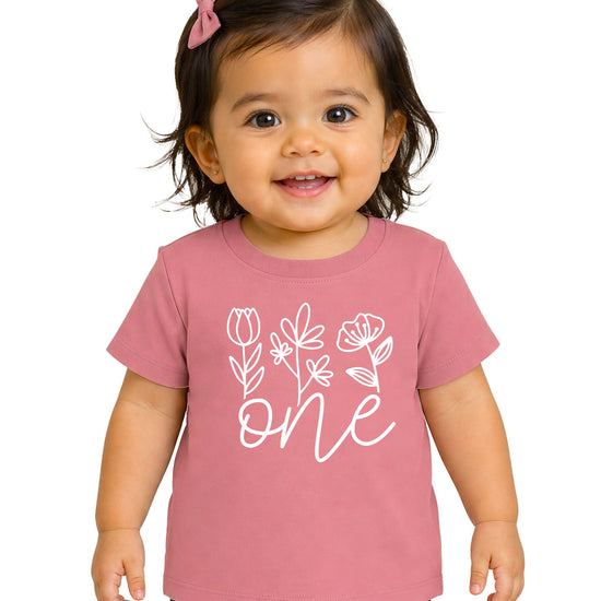 Floral One first birthday shirt for baby girls in white on mauve, third view