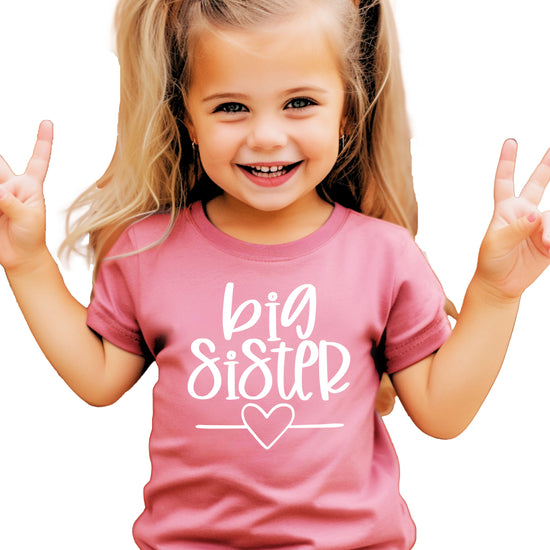 Big Sister heart sibling reveal t-shirt in white on mauve, third view