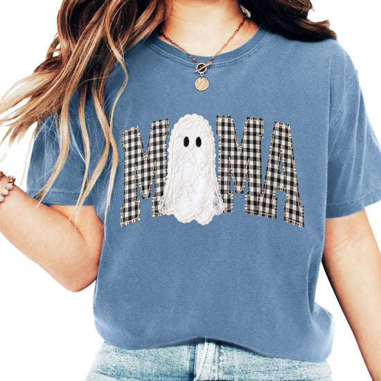 Blue Jean Comfort Colors t-shirt with ink-printed MAMA gingham check lettering and lace-look ghost Halloween graphic, front view
