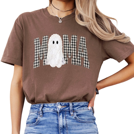 Espresso brown Comfort Colors t-shirt with ink-printed MAMA gingham check lettering and lace-look ghost Halloween graphic, front view