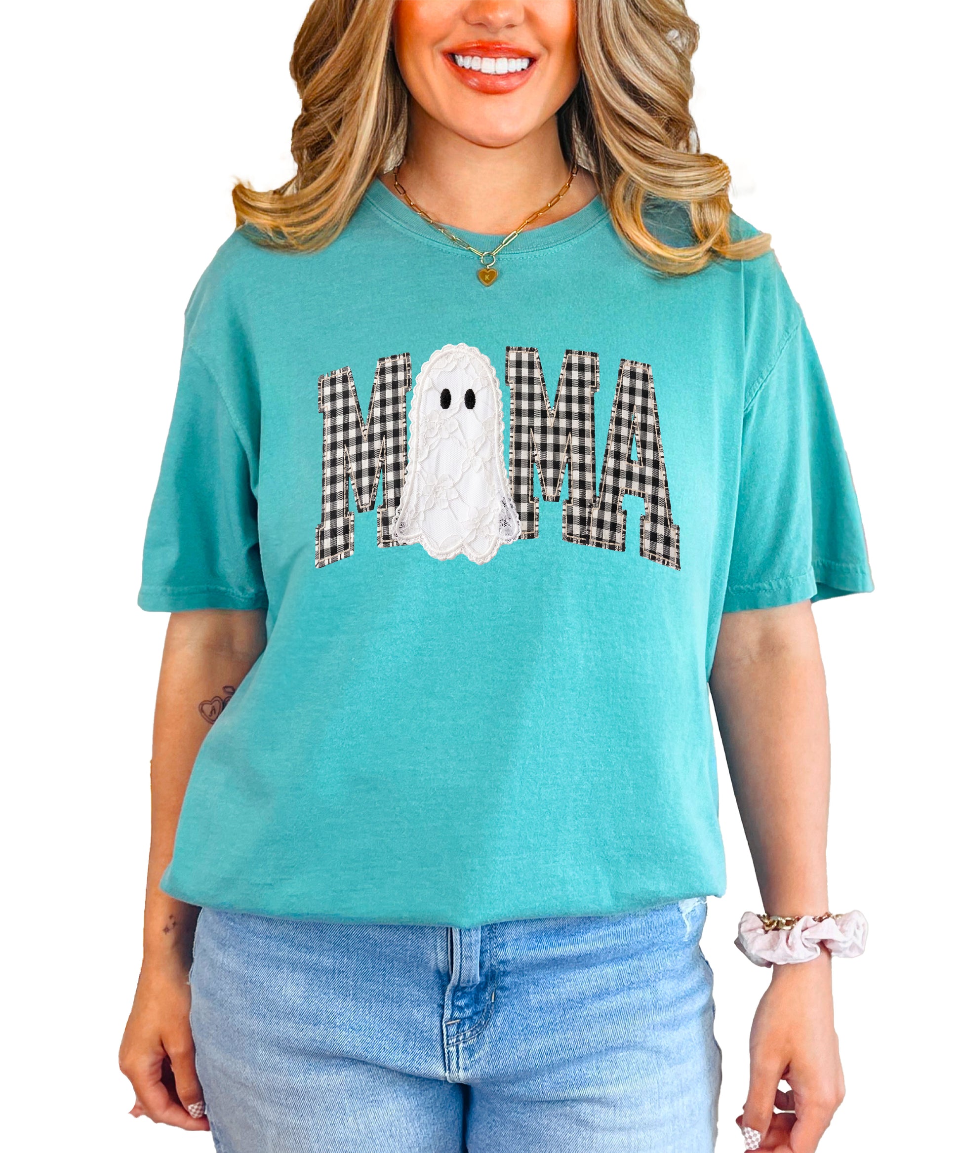 Seafoam Comfort Colors t-shirt with ink-printed MAMA gingham check lettering and lace-look ghost Halloween graphic, front view