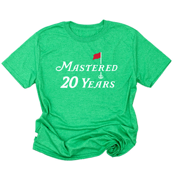 Mastered 20 Years golf 20th birthday shirt in Vintage Green, front view