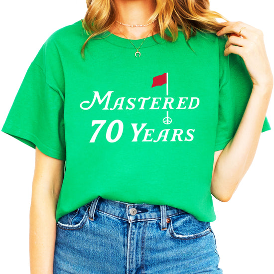 70th birthday golf shirt in Vintage Green, lifestyle view