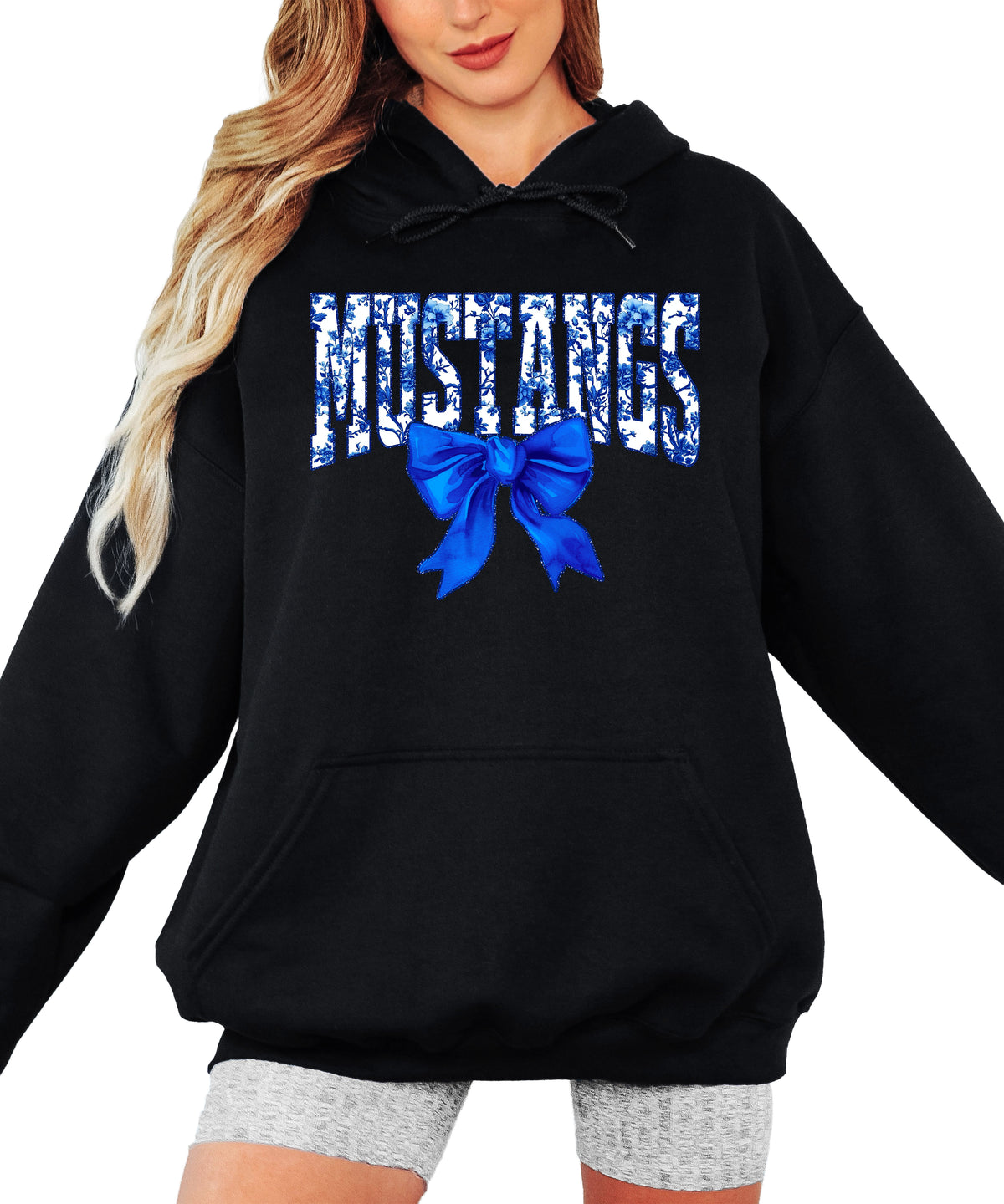 Mustangs floral bow hoodie for women in black, varsity MUSTANGS letters with blue and white floral print and royal blue bow, image 1