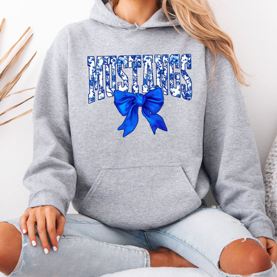 Mustangs floral bow hoodie for women in gray, varsity MUSTANGS letters with blue and white floral print and royal blue bow, image 4