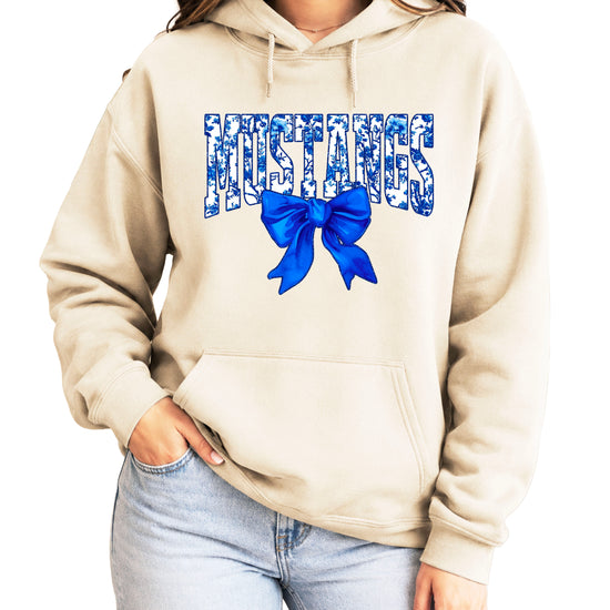 Mustangs floral bow hoodie for women in sand, varsity MUSTANGS letters with blue and white floral print and royal blue bow, image 2