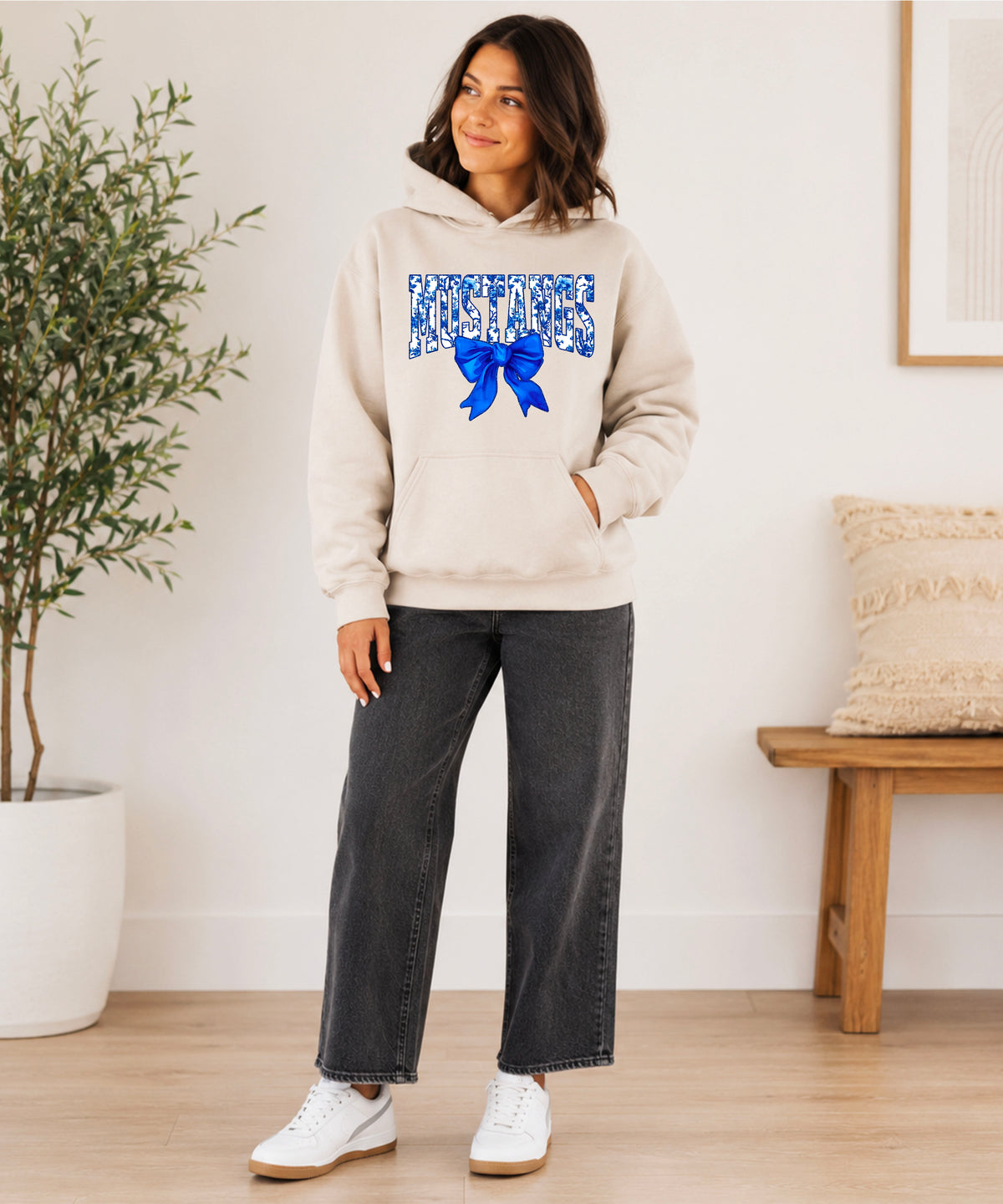 Mustangs floral bow hoodie for women in sand, varsity MUSTANGS letters with blue and white floral print and royal blue bow, image 4