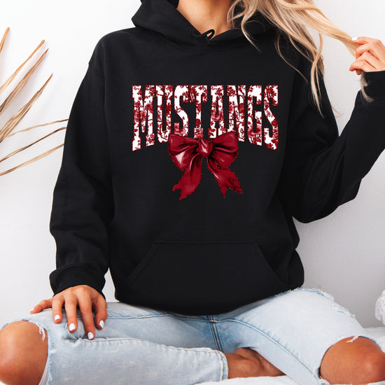 Mustangs floral bow hoodie for women in black, varsity MUSTANGS letters with maroon and white floral print and maroon bow, image 4