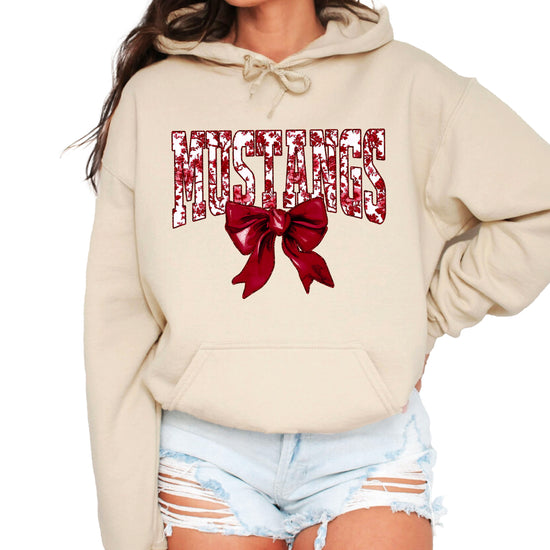 Mustangs floral bow hoodie for women in sand, varsity MUSTANGS letters with maroon and white floral print and maroon bow, image 2