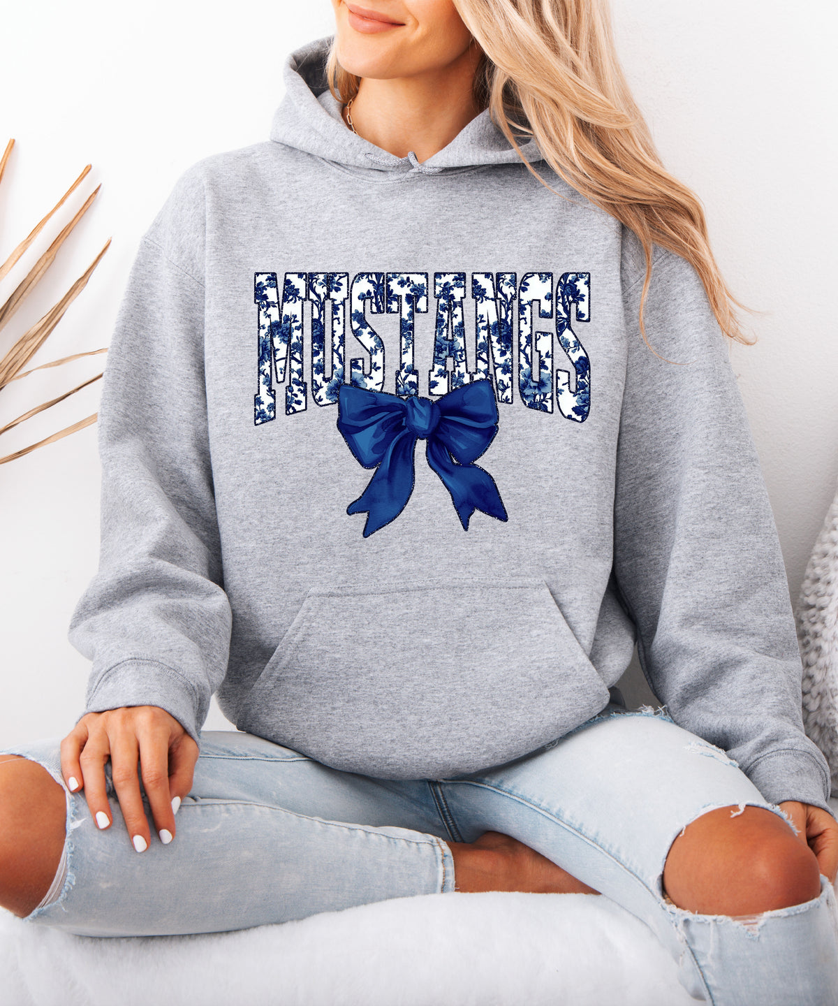 Mustangs floral bow hoodie for women in gray, varsity MUSTANGS letters with navy and white floral print and navy bow, image 4