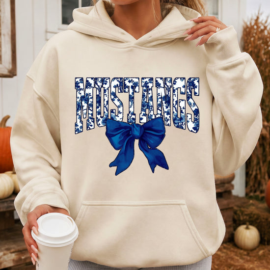 Mustangs floral bow hoodie for women in sand, varsity MUSTANGS letters with navy and white floral print and navy bow, image 4