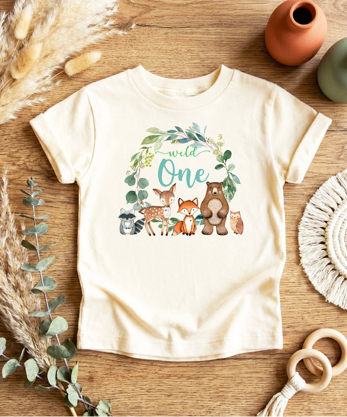 Natural Wild One wreath first birthday tee flat lay front view