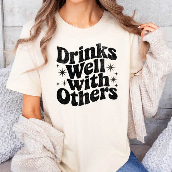 Drinks Well With Others funny graphic tee for women in Natural, detail view