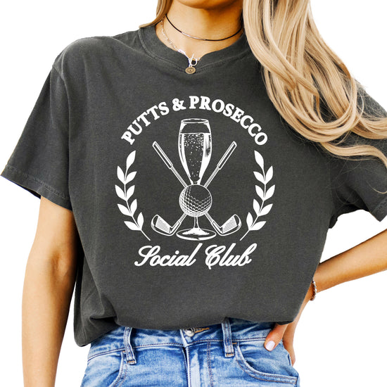 Putts and Prosecco Social Club golf t-shirt for women in Pepper gray, front view