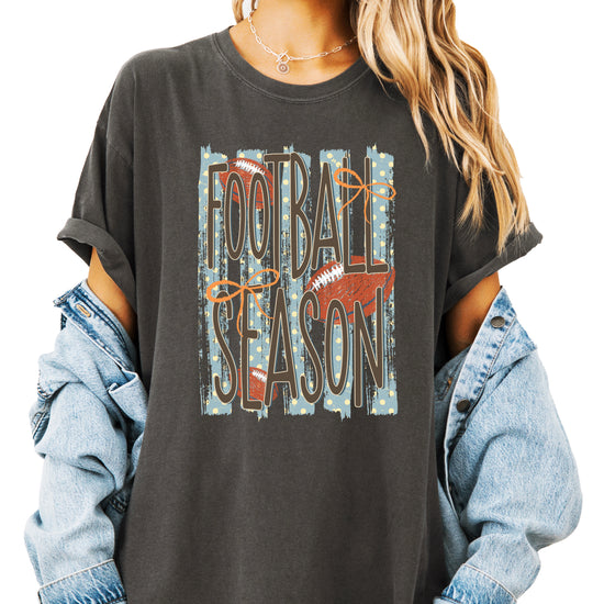Football Season coquette bow Comfort Colors tee in Pepper - front view