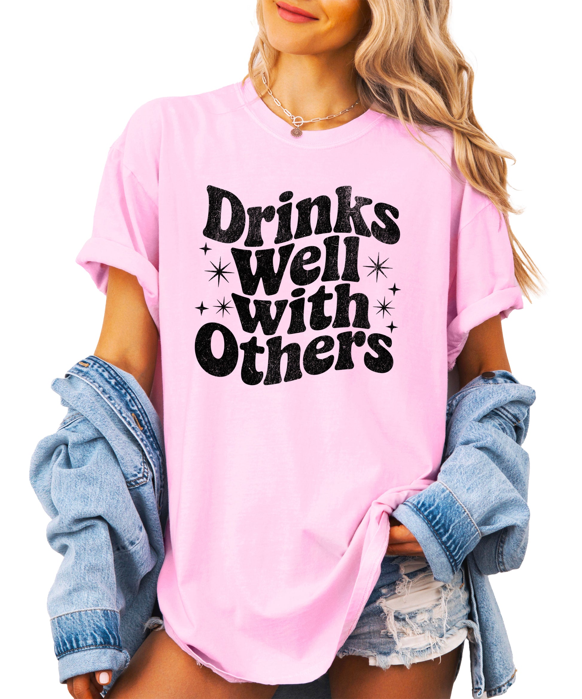 Drinks Well With Others funny graphic tee for women in Pink, back view
